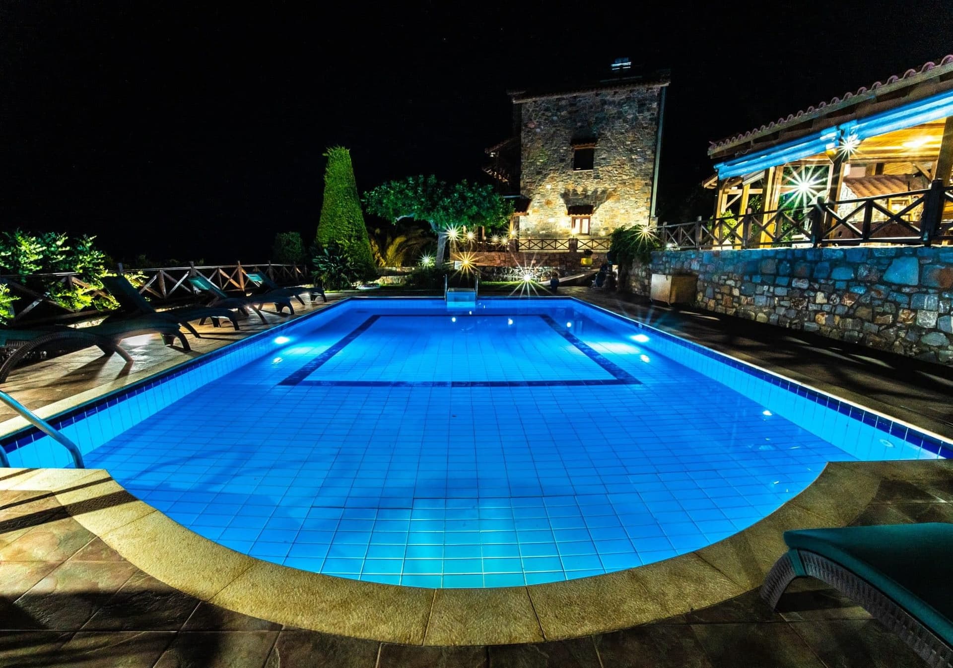 Gaia pool illuminated at night